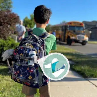boy carrying aerochamber2go* spacer backpack